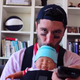Image for article titled Hey, Wanna Look Even Dumber? Wear This Fake Baby That's Also a Flask